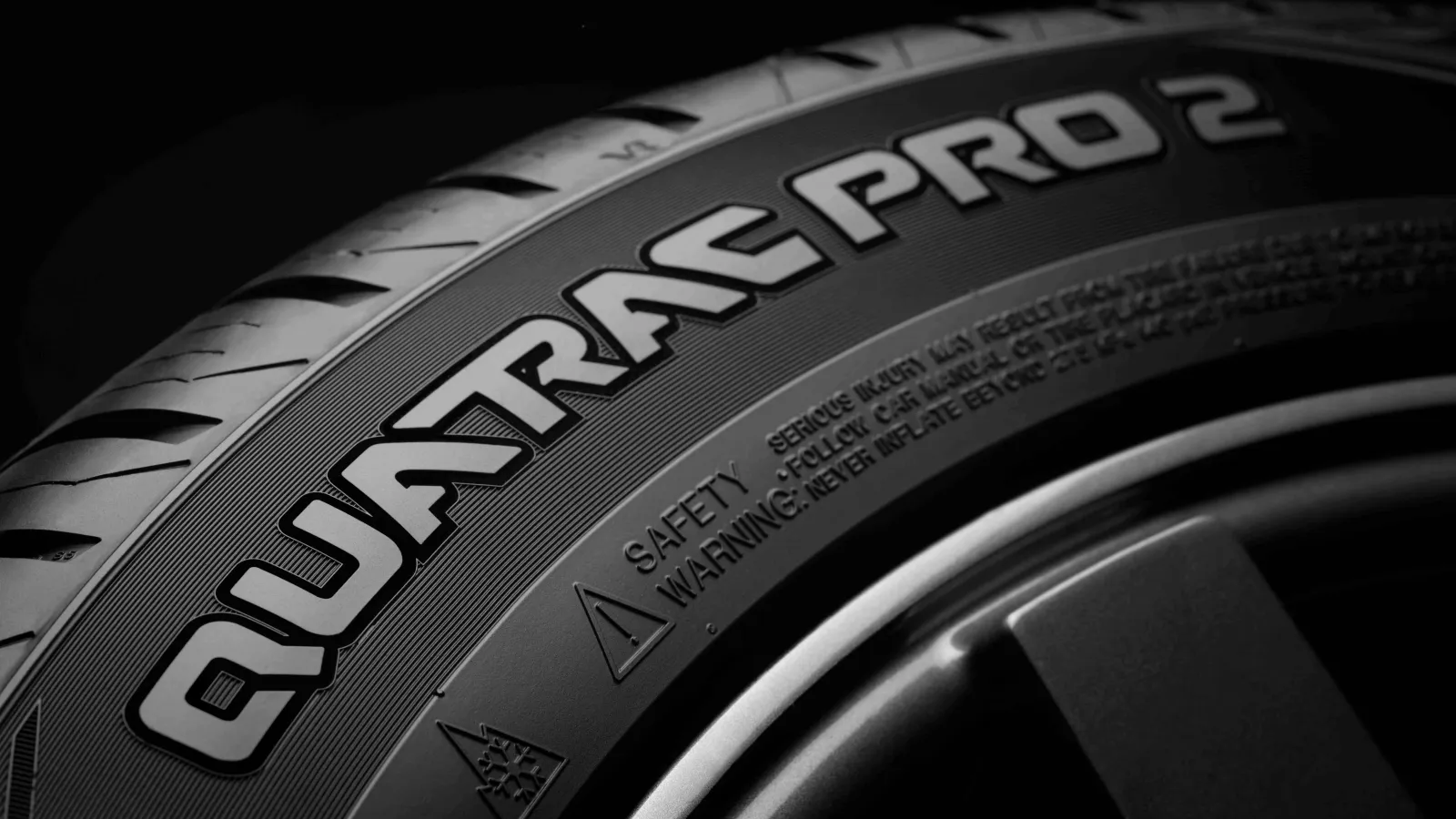 Vredestein Quatrac Pro 2 UHP all-season tyre showing V-shaped directional tread pattern and 3D sipes