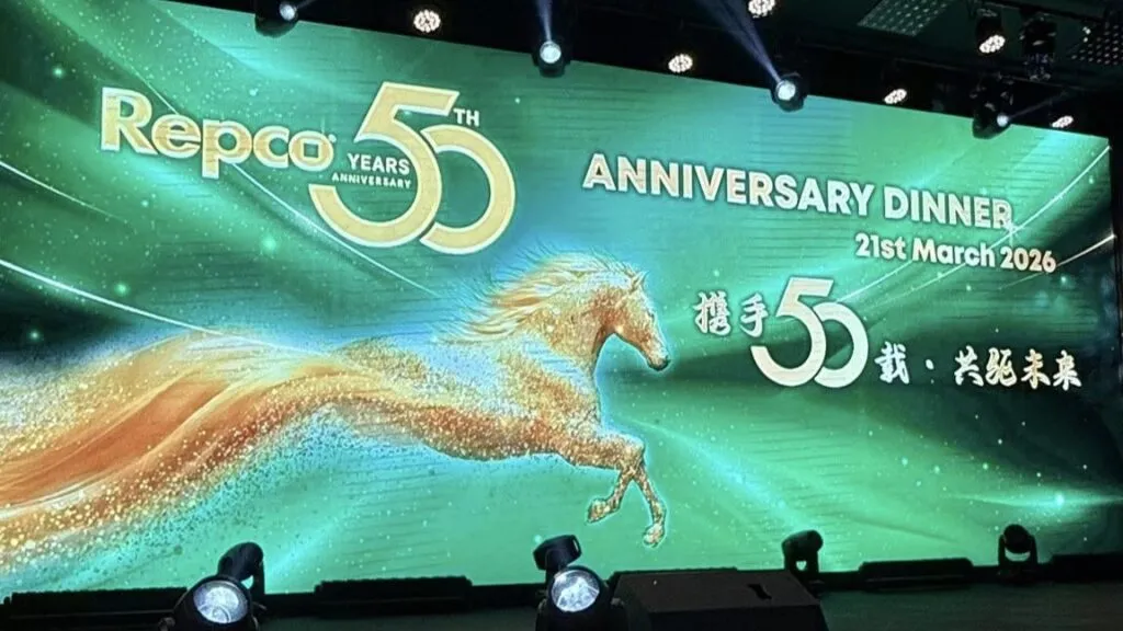 Repco Malaysia 50th anniversary dinner celebration stage with company logo and 50 years of excellence branding