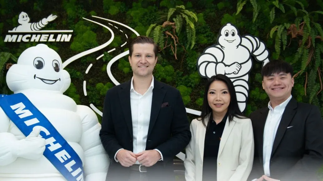 Representatives from Michelin Malaysia and Lalamove posing with the Michelin Man. (Photo: Michelin/LinkedIn)
