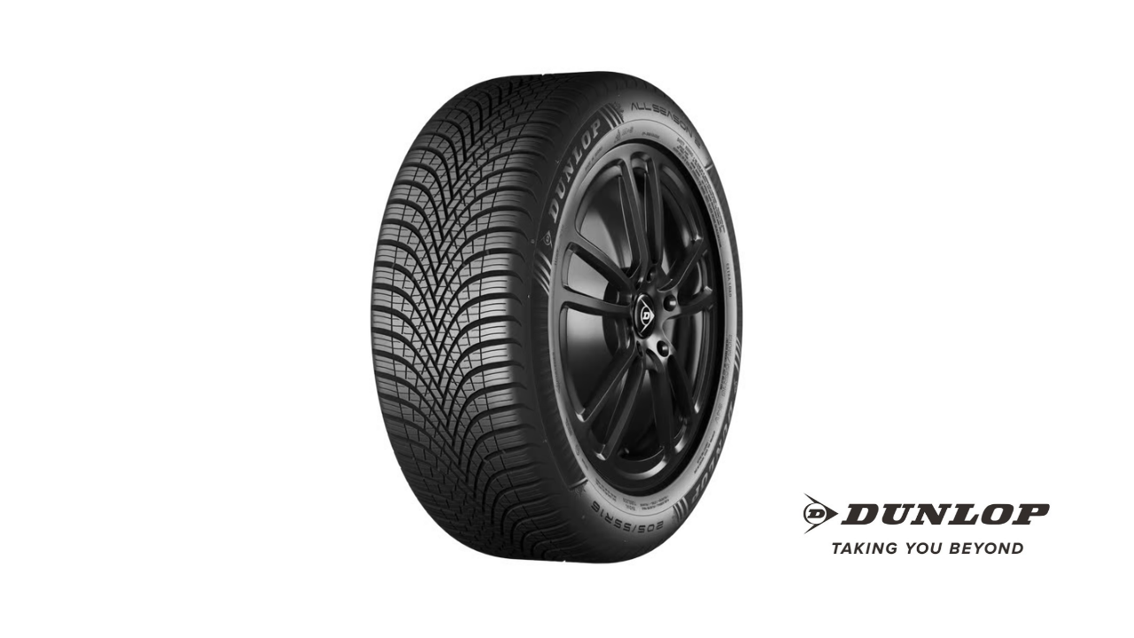A studio photo of a Dunlop All Season 2 tyre mounted on a dark alloy wheel against a white background with the Dunlop logo.